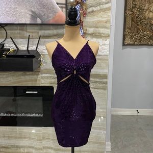 Purple Zara metallic mini dress. Circle opening, chest area. Cross cross back.